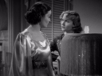 Movie still from “My Man Godfrey” (1936), directed by Gregory La Cava – A woman standing next to another woman in a room; Medium shot, High angle