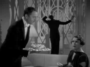 Movie still from “My Man Godfrey” (1936), directed by Gregory La Cava – A black and white photo of a man and a woman; Medium shot, High angle