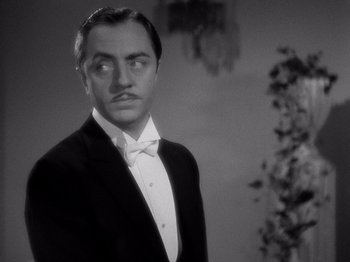 Movie still from “My Man Godfrey” (1936), directed by Gregory La Cava – A black and white photo of a man in a tuxedo; Close Up shot, Low angle