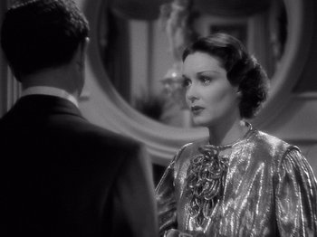 Movie still from “My Man Godfrey” (1936), directed by Gregory La Cava – An old photo of a man and a woman talking; Close Up shot, Over the shoulder angle