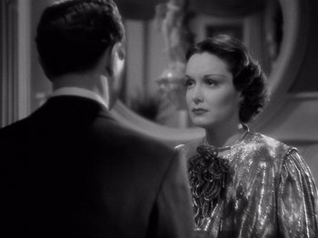 Movie still from “My Man Godfrey” (1936), directed by Gregory La Cava – A man and a woman are standing in front of each other; Close Up shot, Over the shoulder angle