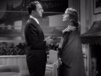 Movie still from “My Man Godfrey” (1936), directed by Gregory La Cava – A man and a woman talking to each other; Medium shot, High angle