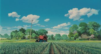 Movie still from “My Neighbor Totoro” (1988), directed by Hayao Miyazaki – A painting of a tractor in the middle of a corn field; Extreme Wide shot, Low angle