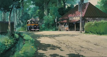 Movie still from “My Neighbor Totoro” (1988), directed by Hayao Miyazaki – A bus is parked in the middle of a dirt road; Extreme Wide shot, Low angle
