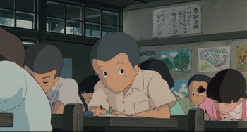 Movie still from “My Neighbor Totoro” (1988), directed by Hayao Miyazaki – An animated scene of a boy writing on a paper; Medium shot, High angle