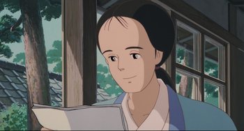 Movie still from “My Neighbor Totoro” (1988), directed by Hayao Miyazaki – An animated picture of a woman holding a book; Close Up shot, Low angle