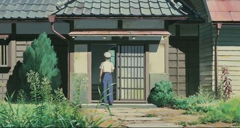 Movie still from “My Neighbor Totoro” (1988), directed by Hayao Miyazaki – A man standing in front of an open door; Wide shot, Low angle
