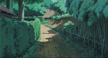 Movie still from “My Neighbor Totoro” (1988), directed by Hayao Miyazaki – A painting of a dirt road in the middle of a forest; Extreme Wide shot, Low angle