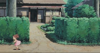 Movie still from “My Neighbor Totoro” (1988), directed by Hayao Miyazaki – A painting of a house and a garden with bushes; Extreme Wide shot, Low angle