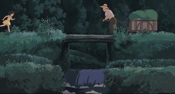 Movie still from “My Neighbor Totoro” (1988), directed by Hayao Miyazaki – An animated scene of a man standing on a bridge; Wide shot, High angle