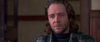 Movie still from “Mystery, Alaska” (1999), directed by Jay Roach – A person with long hair; Close Up shot, Over the shoulder angle