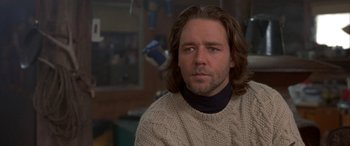 Movie still from “Mystery, Alaska” (1999), directed by Jay Roach – A person with long hair; Close Up shot, Low angle