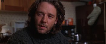 Movie still from “Mystery, Alaska” (1999), directed by Jay Roach – A person with long hair; Close Up shot, Over the shoulder angle