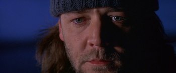 Movie still from “Mystery, Alaska” (1999), directed by Jay Roach – A person wearing a hat; Extreme Close Up shot, Low angle