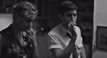 Movie still from “Frances Ha” (2012), directed by Noah Baumbach – A man and a woman are eating some food together; Medium shot, Over the shoulder angle