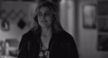 Movie still from “Frances Ha” (2012), directed by Noah Baumbach – A black and white photo of a woman looking at the camera; Close Up shot, Over the shoulder angle
