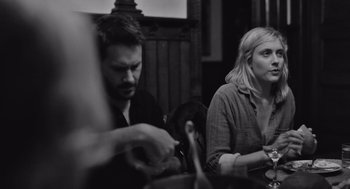 Movie still from “Frances Ha” (2012), directed by Noah Baumbach – A man and a woman sitting at a dinner table; Close Up shot, Over the shoulder angle