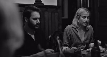 Movie still from “Frances Ha” (2012), directed by Noah Baumbach – A man and a woman sitting at a dinner table; Close Up shot, Over the shoulder angle