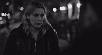 Movie still from “Frances Ha” (2012), directed by Noah Baumbach – Black and white photograph of a woman with long blonde hair; Close Up shot, Over the shoulder angle