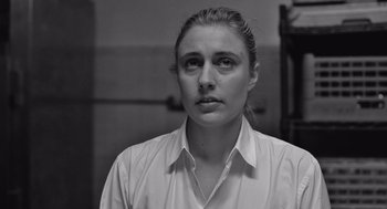 Movie still from “Frances Ha” (2012), directed by Noah Baumbach – Black and white photograph of a woman looking at the camera; Close Up shot, Low angle