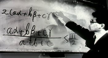 Movie still from “Naqoyqatsi” (2002), directed by Godfrey Reggio – A person writing on a glass board with a marker; Extreme Close Up shot, Overhead angle