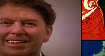 Movie still from “Naqoyqatsi” (2002), directed by Godfrey Reggio – A man's face with a white background; Close Up shot, Low angle