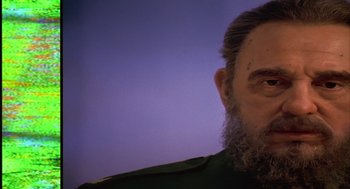 Movie still from “Naqoyqatsi” (2002), directed by Godfrey Reggio – A man with a beard and mustache; Close Up shot, Low angle