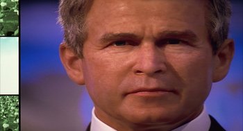 Movie still from “Naqoyqatsi” (2002), directed by Godfrey Reggio – George w; Extreme Close Up shot, Low angle