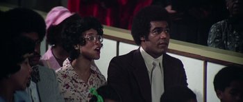 Movie still from “Nashville” (1975), directed by Robert Altman – A man and a woman are sitting in front of each other; Close Up shot, Low angle