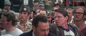 Movie still from “Nashville” (1975), directed by Robert Altman – A man holding a gun up to his head; Close Up shot, Low angle