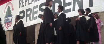 Movie still from “Nashville” (1975), directed by Robert Altman – A group of young people dressed in black robes; Wide shot, Low angle