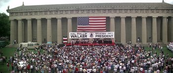 Movie still from “Nashville” (1975), directed by Robert Altman – A crowd of people gathered in front of a building; Extreme Wide shot, High angle