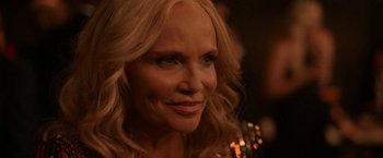 Movie still from “National Champions” (2021), directed by Ric Roman Waugh – A person with blonde hair; Close Up shot, Over the shoulder angle