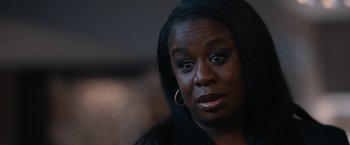 Movie still from “National Champions” (2021), directed by Ric Roman Waugh – A person wearing a black shirt; Close Up shot, Over the shoulder angle