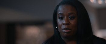 Movie still from “National Champions” (2021), directed by Ric Roman Waugh – A person wearing a black shirt; Close Up shot, Over the shoulder angle