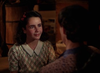 Movie still from “National Velvet” (1944), directed by Clarence Brown – A young girl talking to an older woman; Close Up shot, Over the shoulder angle