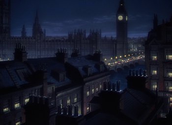 Movie still from “National Velvet” (1944), directed by Clarence Brown – A view of a city skyline at night with a clock tower in the background; Extreme Wide shot, High angle