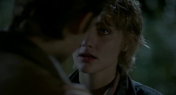 Movie still from “Near Dark” (1987), directed by Kathryn Bigelow – A person holding a pen; Close Up shot, Over the shoulder angle
