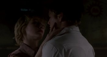 Movie still from “Near Dark” (1987), directed by Kathryn Bigelow – A man and a woman looking into each others eyes; Close Up shot, Over the shoulder angle
