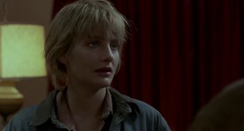 Movie still from “Near Dark” (1987), directed by Kathryn Bigelow – A person with short hair; Close Up shot, Over the shoulder angle