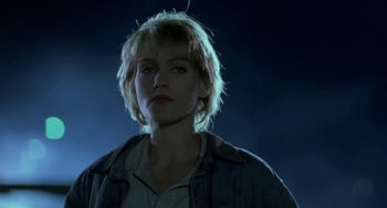 Movie still from “Near Dark” (1987), directed by Kathryn Bigelow – A person with short blonde hair; Close Up shot, Low angle
