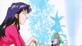 Movie still from “Neon Genesis Evangelion: Death & Rebirth” (1997), directed by Tensai Okamura – A woman sitting in front of a table with chopsticks in her hand; Medium shot, Low angle