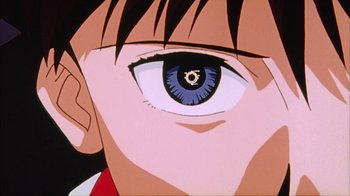 Movie still from “Neon Genesis Evangelion: Death & Rebirth” (1997), directed by Tensai Okamura – View of a person's blue eye; Extreme Close Up shot, Low angle