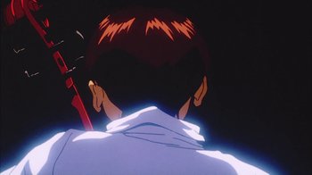 Movie still from “Neon Genesis Evangelion: Death & Rebirth” (1997), directed by Tensai Okamura – A person laying on a bed in the dark; Extreme Close Up shot, Low angle