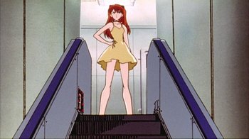 Movie still from “Neon Genesis Evangelion: Death & Rebirth” (1997), directed by Tensai Okamura – A woman standing on top of an escalator; Medium shot, Low angle