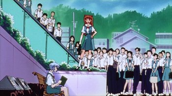 Movie still from “Neon Genesis Evangelion: Death & Rebirth” (1997), directed by Tensai Okamura – An animated scene of a group of people standing on steps; Wide shot, Low angle