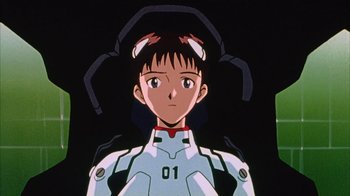 Movie still from “Neon Genesis Evangelion: Death & Rebirth” (1997), directed by Tensai Okamura – A person wearing a helmet; Close Up shot, Low angle