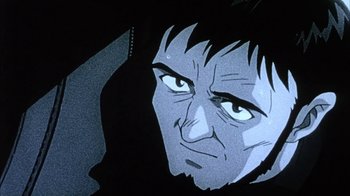 Movie still from “Neon Genesis Evangelion: Death & Rebirth” (1997), directed by Tensai Okamura – An animated picture of a man with a black shirt; Extreme Close Up shot, Low angle