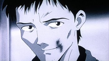 Movie still from “Neon Genesis Evangelion: Death & Rebirth” (1997), directed by Tensai Okamura – A black and white picture of a man's face; Extreme Close Up shot, Low angle
