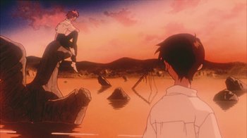 Movie still from “Neon Genesis Evangelion: Death & Rebirth” (1997), directed by Tensai Okamura – A man and a woman standing in the water at the beach; Extreme Wide shot, High angle